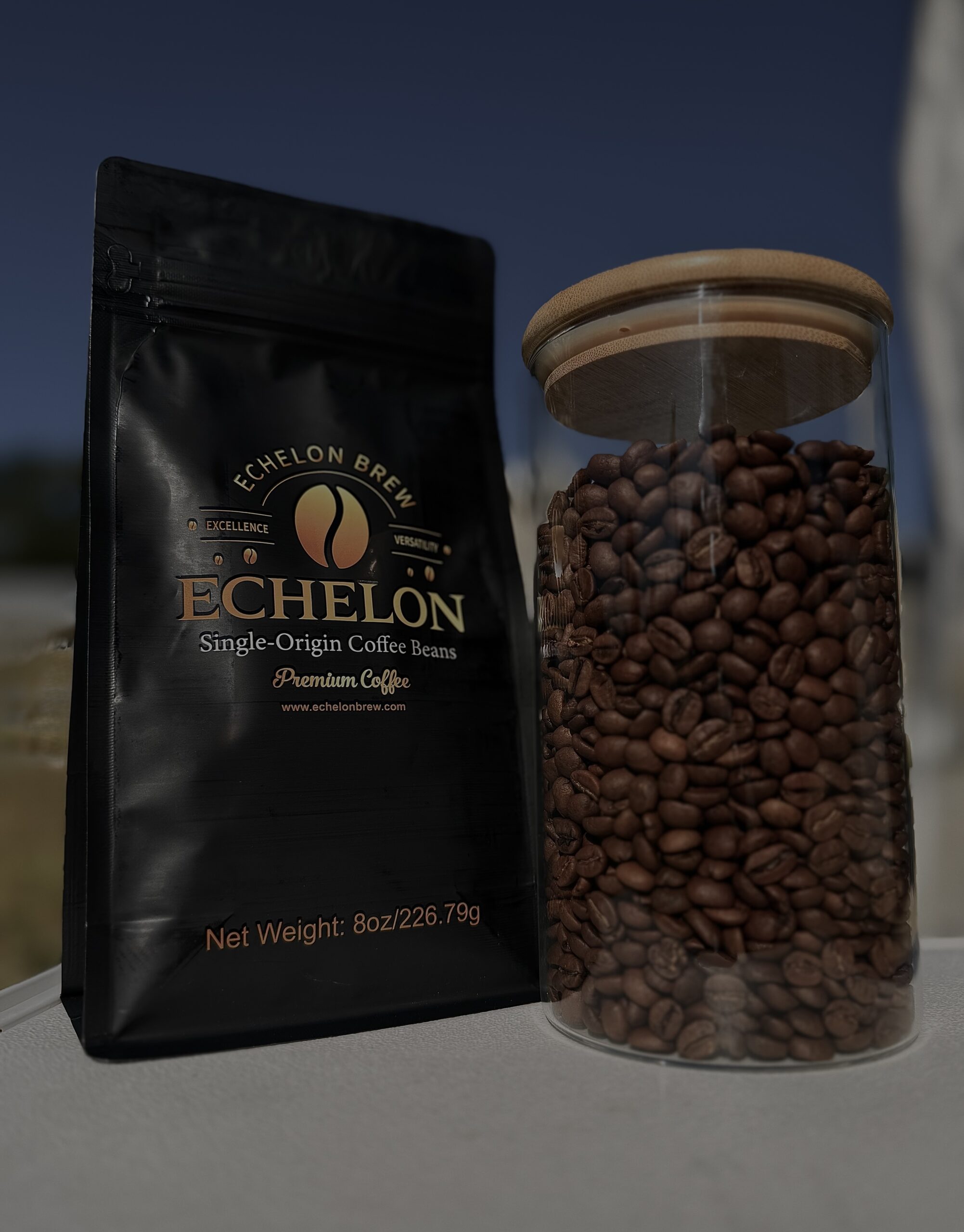 Bag of coffee beans and roasted coffee beans